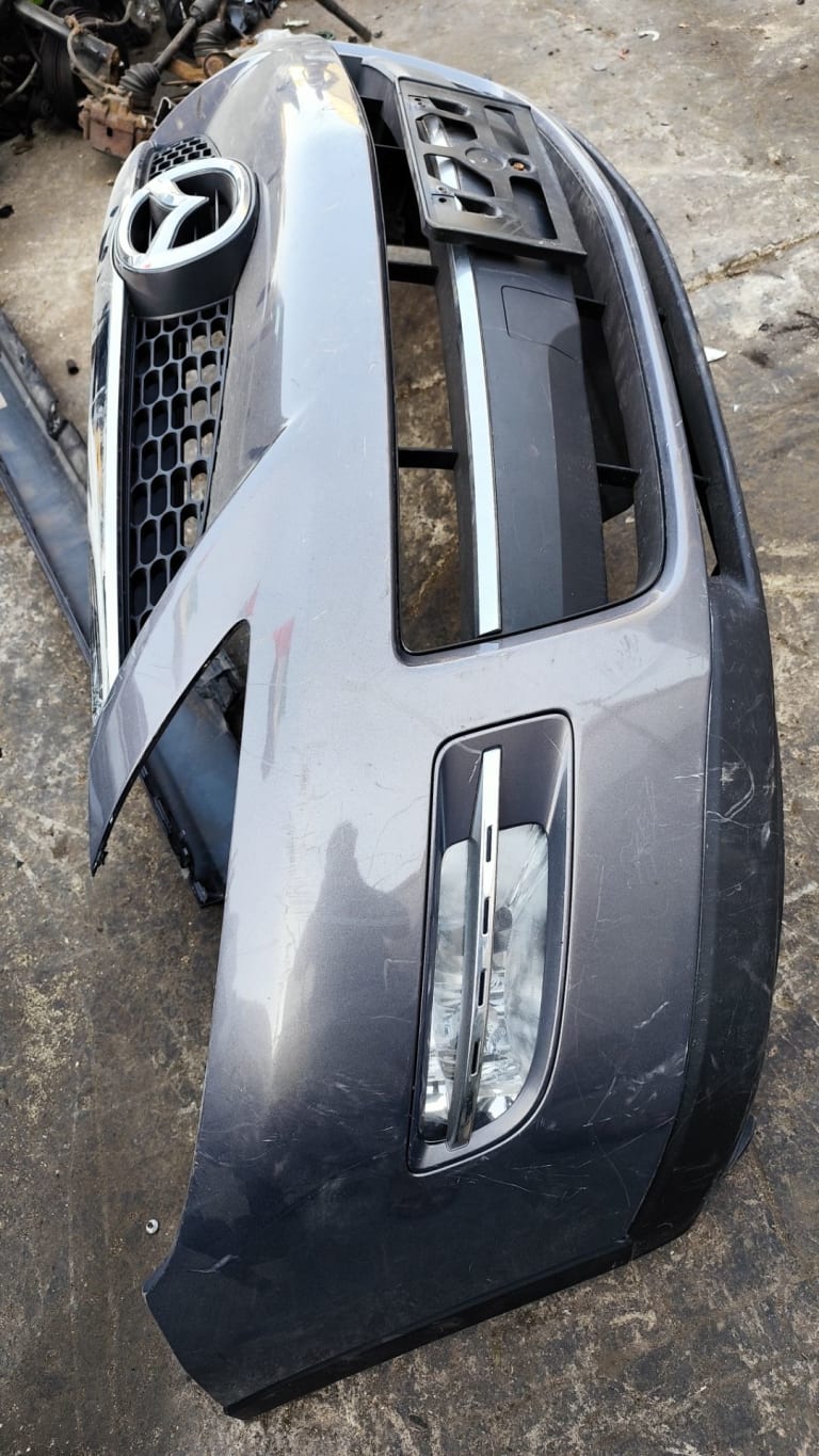 Bumper + Grille Mazda CX-9