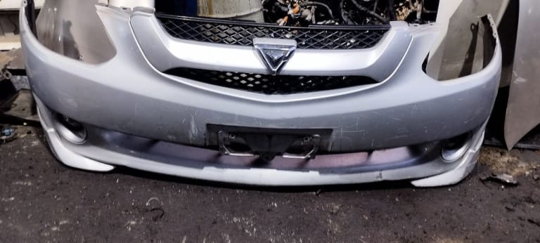 Bumper + Grille Toyota Caldina