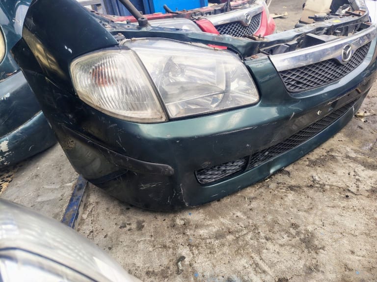 Nose cut Mazda Familia used in Sharjah — photo 2