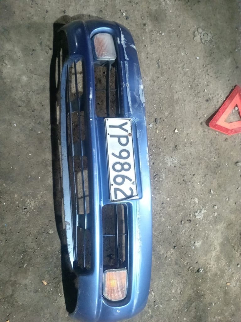 Toyota Sprinter Marino Бампер передний 