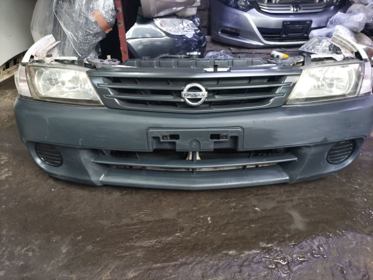 Bumper + Grille Nissan Wingroad