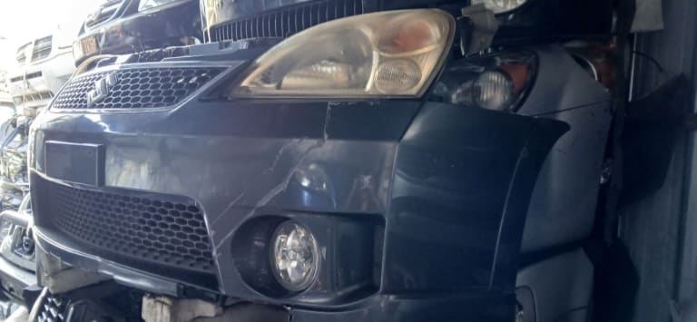 Bumper + Grille + Headlights Suzuki Liana used in Sharjah — photo 2