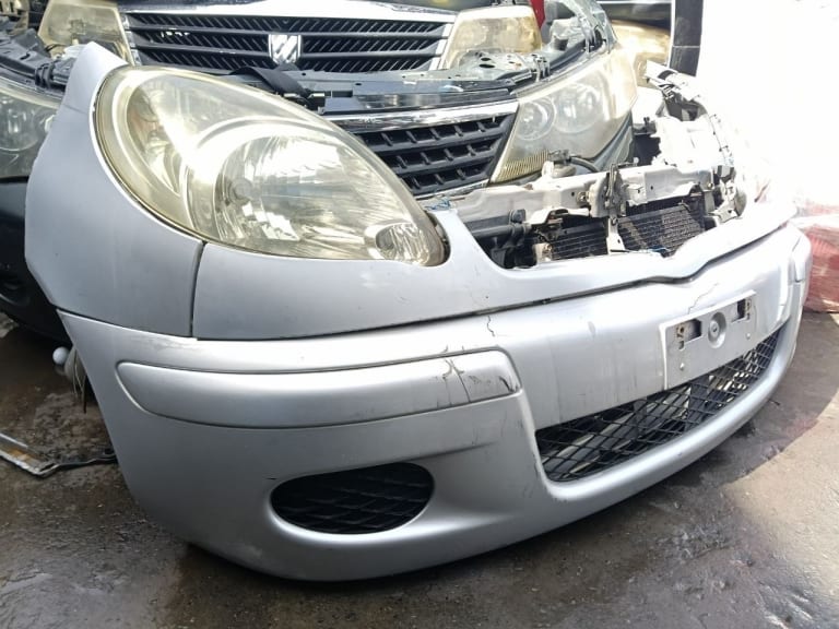 Bumper + Headlights Toyota Funcargo