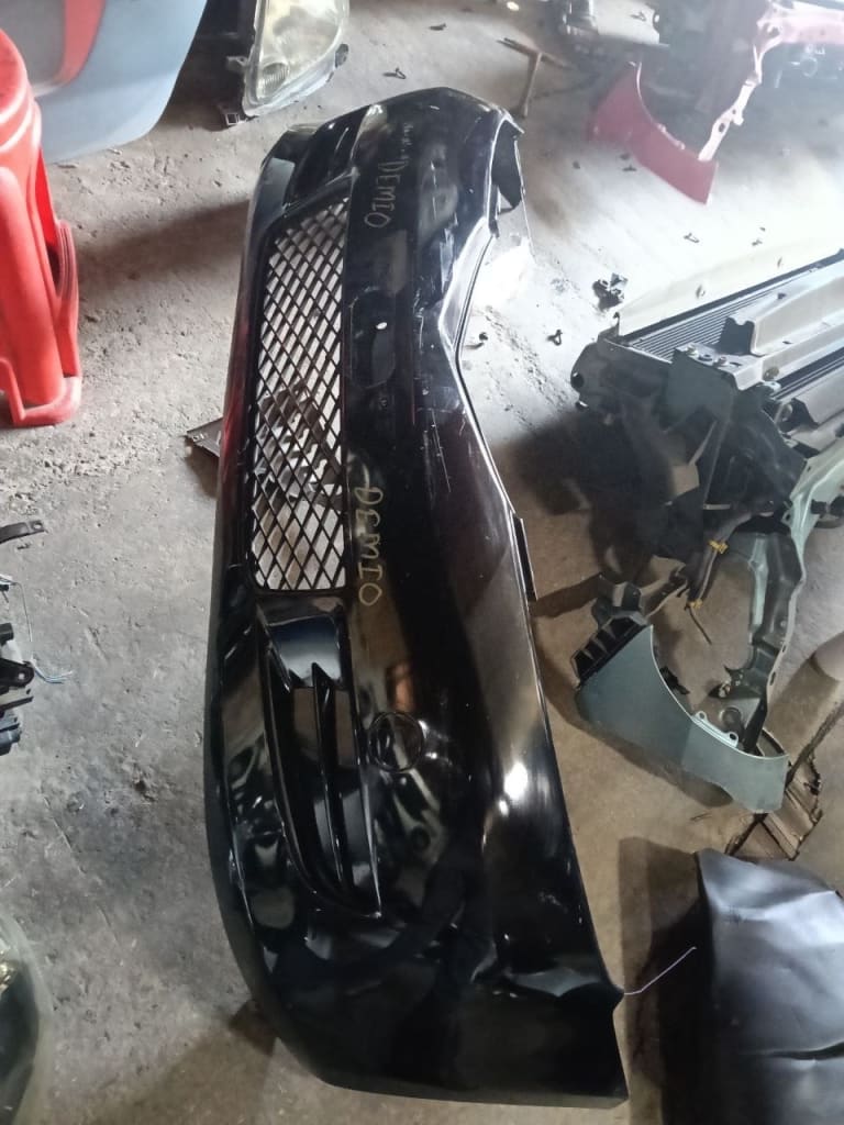 Bumper + Headlights Mazda Demio used in Sharjah — photo 2
