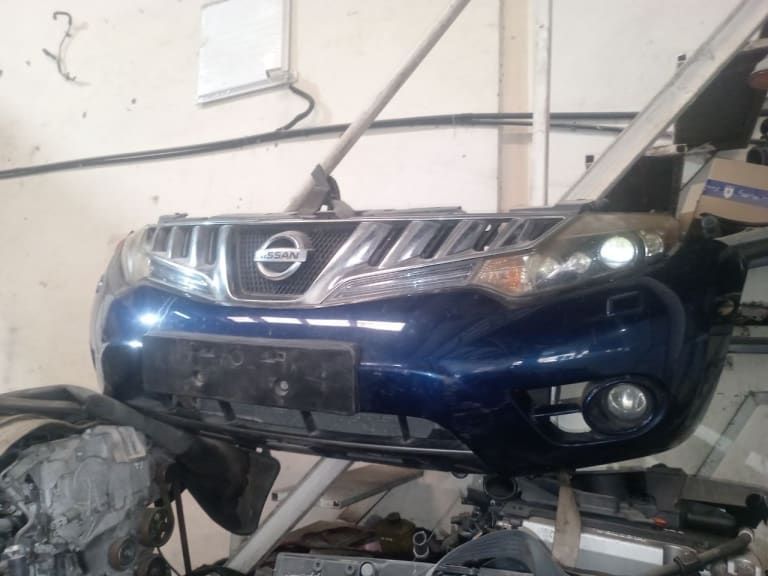 Bumper + Grille + Headlights Nissan Murano used in Sharjah — photo 2