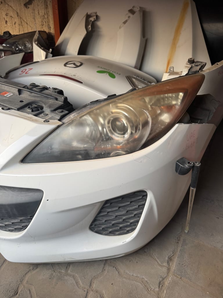 Nose cut + Hood + Fender Mazda Axela used in Sharjah — photo 2
