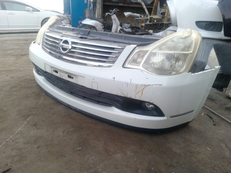 Bumper + Grille + Headlights Nissan Bluebird used in Sharjah — photo 2