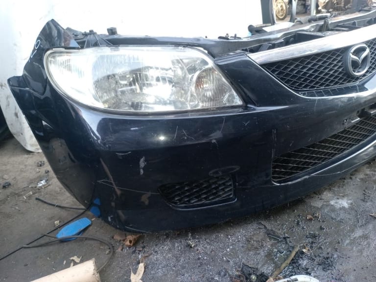 Nose cut Mazda 323 used in Sharjah — photo 2