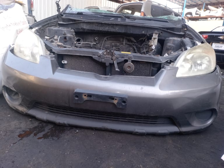 Toyota Matrix Front Bumper and Headlights (x2)