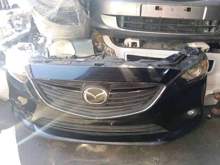Bumper + Grille Mazda 6