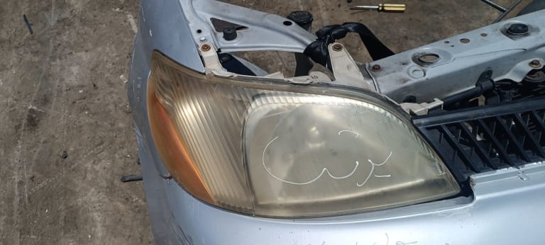 Bumper + Grille + Headlights Toyota Platz used in Sharjah — photo 2