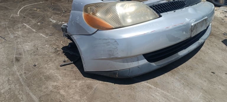 Bumper + Grille + Headlights Toyota Platz used in Sharjah — photo 5
