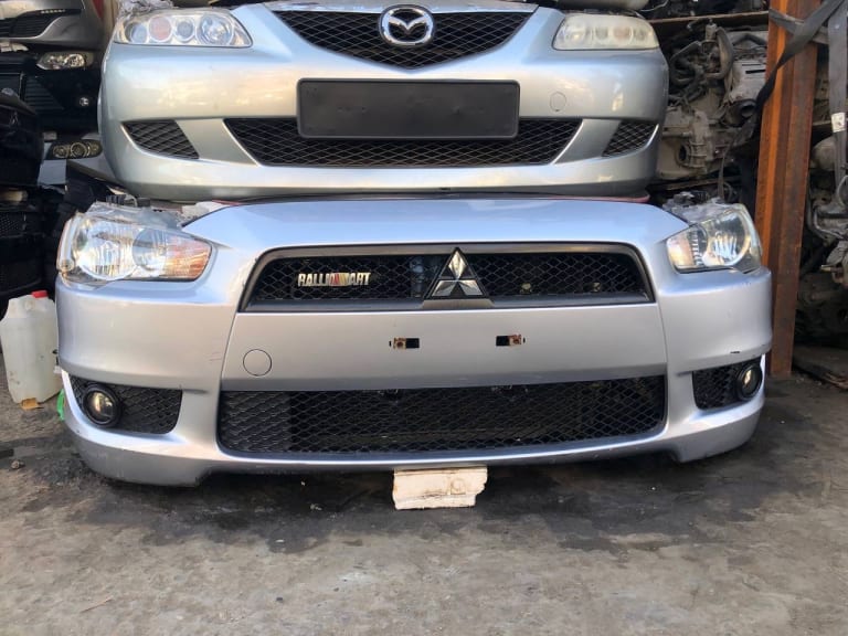 Mitsubishi Lancer Nose Cut, Hood, Mirrors (x2) and Tail Lights (x2)