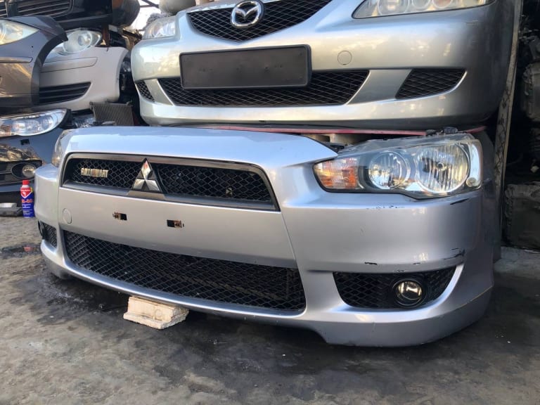 Nose cut + Hood + Mirror Mitsubishi Lancer used in Sharjah — photo 2