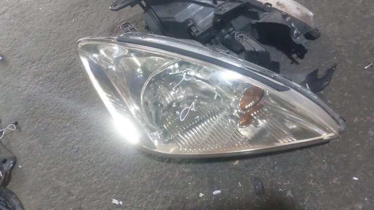 Headlights Mitsubishi Lancer used in Sharjah — photo 6
