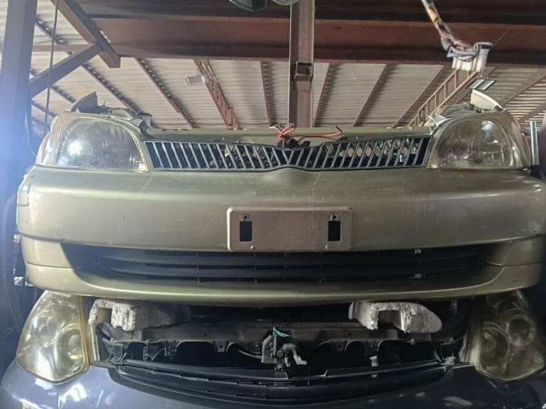 Toyota Platz Toyota Platz Front Bumper with Grille and Headlights (x2)