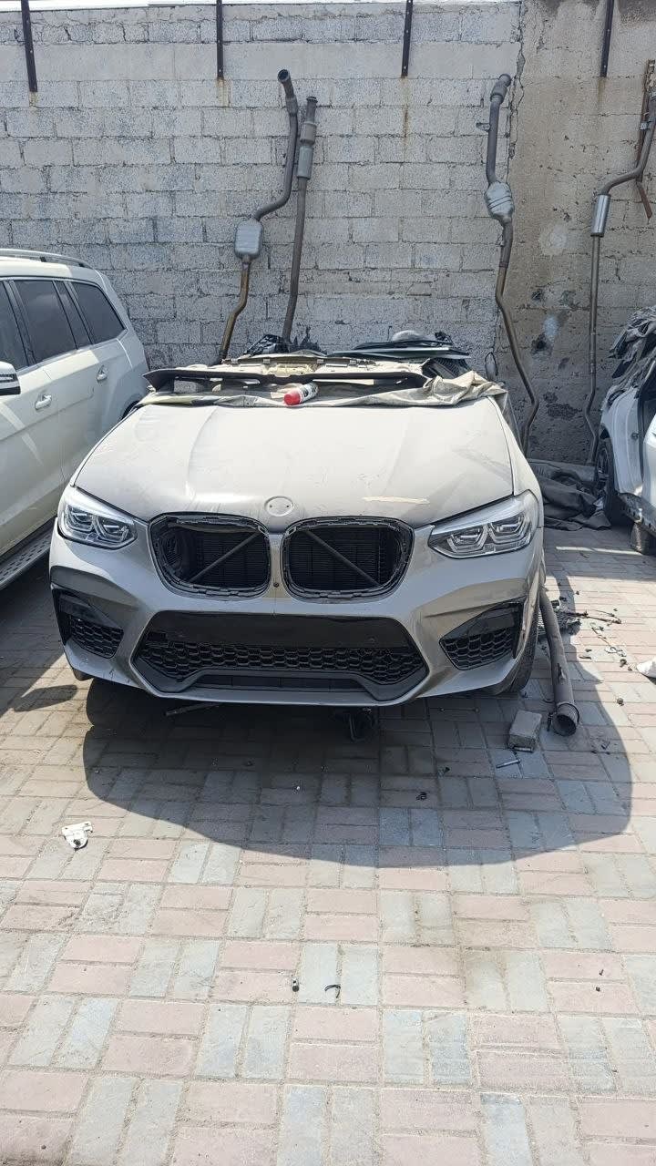 Silver BMW X3 / X4 G01/G02 halfcut front — bumper, kidney grille, headlights and hood, Sharjah market