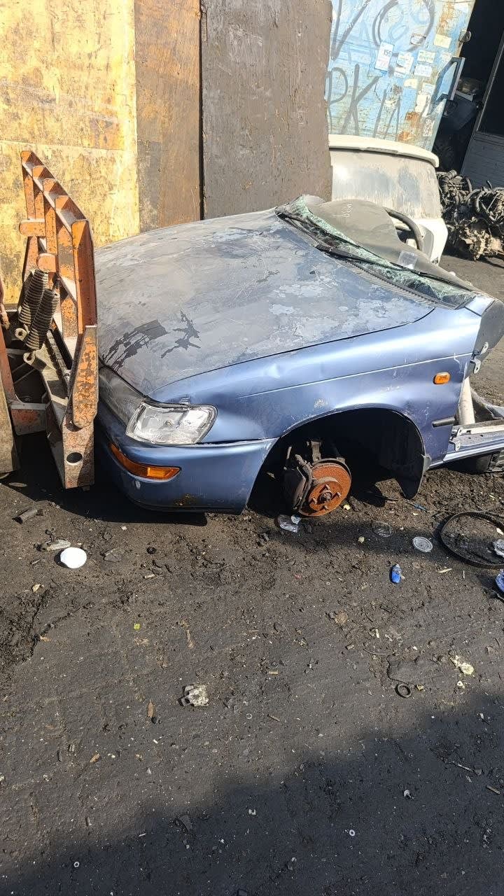 Light blue Toyota Corolla front halfcut — hood, bumper, headlight and fender, Sharjah market