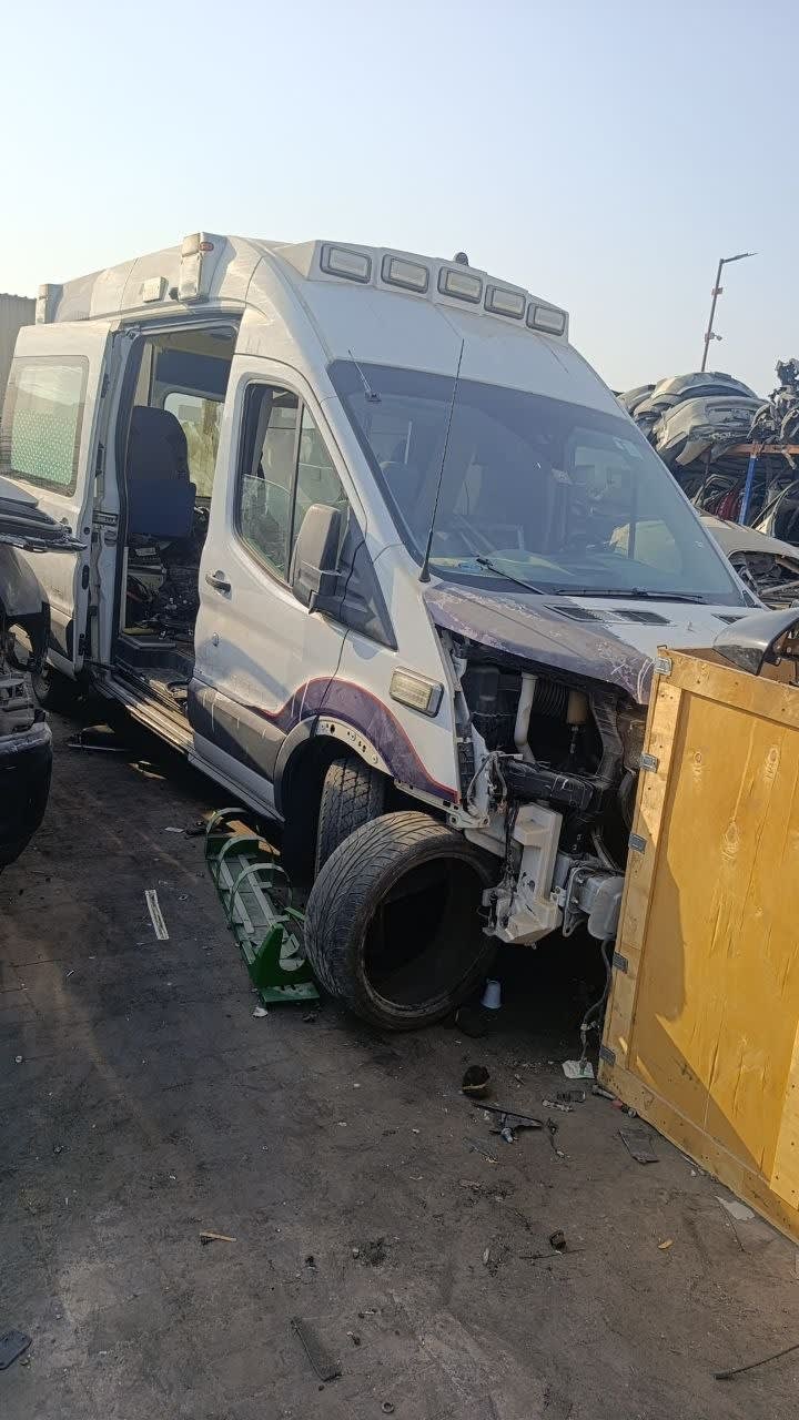 White Ford Transit van halfcut — cab, side door and damaged front end, Sharjah market