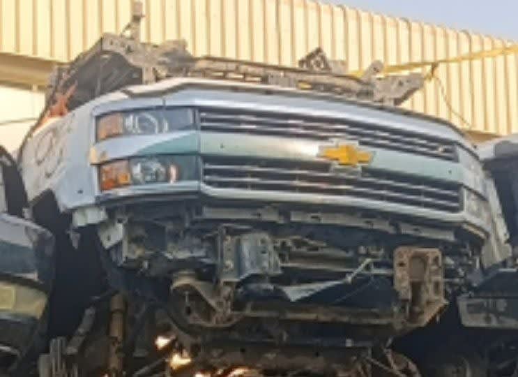 Silver Chevrolet Silverado HD front cut — grille, headlights and bumper, Sharjah market