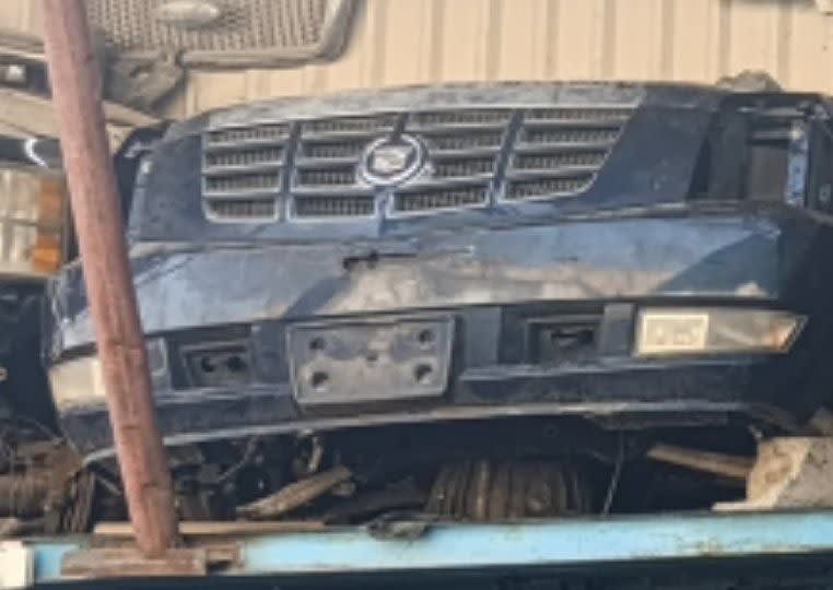 Dark blue Cadillac Escalade front halfcut — grille, bumper and headlights, Sharjah market