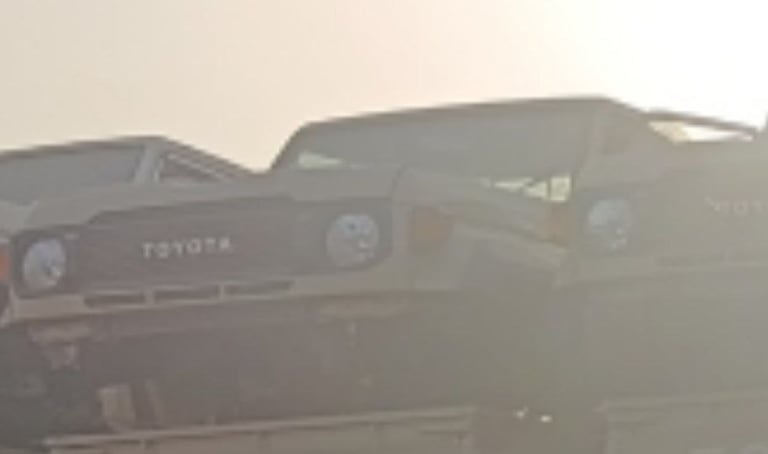 Silver-grey Toyota FJ Cruiser front halfcuts — grille, round headlights and bumper, Sharjah market