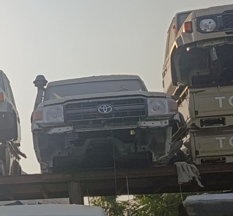 Dark grey Toyota Land Cruiser 70 Series halfcut — grille, headlights and hood, Sharjah market