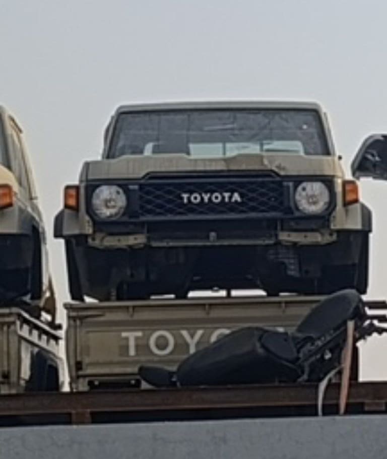 Tan Toyota Land Cruiser 70 Series front — grille, round headlights and bumper, Sharjah market