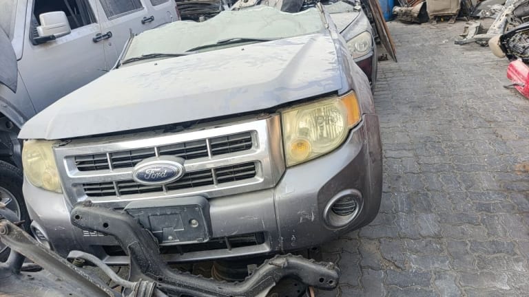 Silver Ford Escape SUV halfcut front end — hood, grille, headlights and bumper, Sharjah market