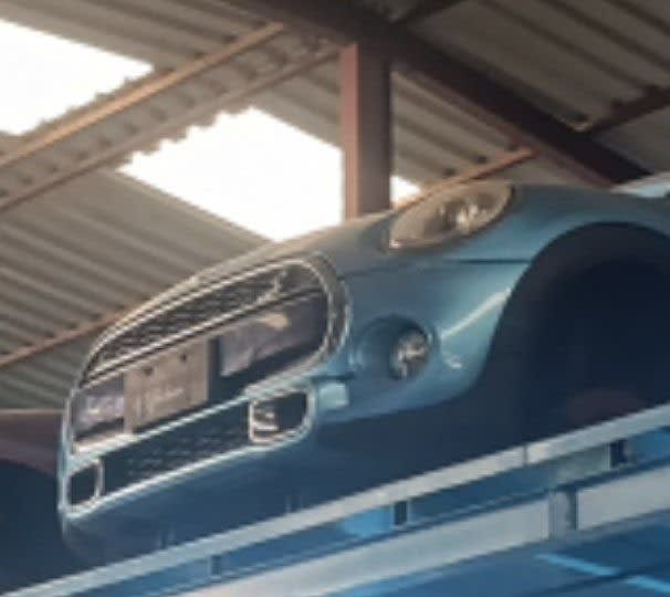 Light blue MINI Cooper hatchback halfcut front — grille, headlights and bumper, Sharjah market