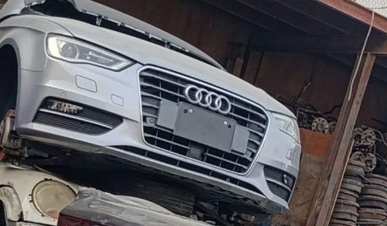 Silver Audi A3 front halfcut — bumper, single-frame grille and headlights, Sharjah market