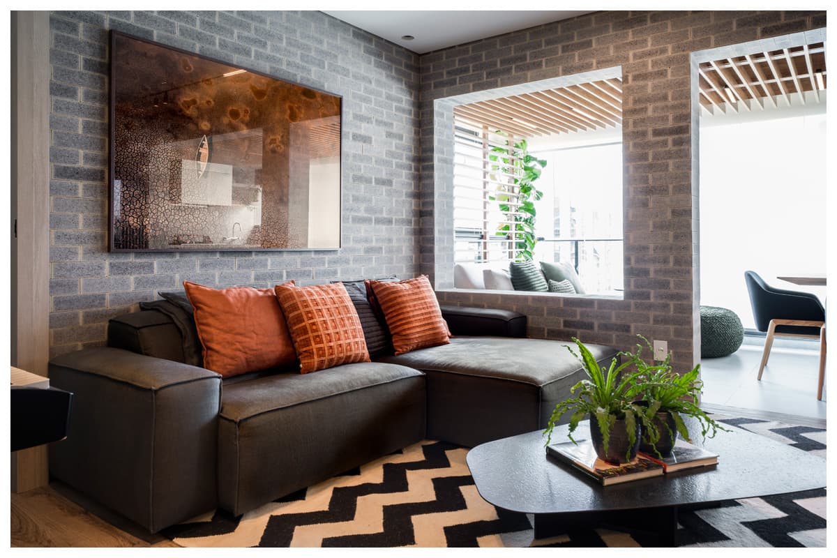 Apartamento compacto masculino com integração e materialidade Apartamento compacto masculino com integração e materialidade