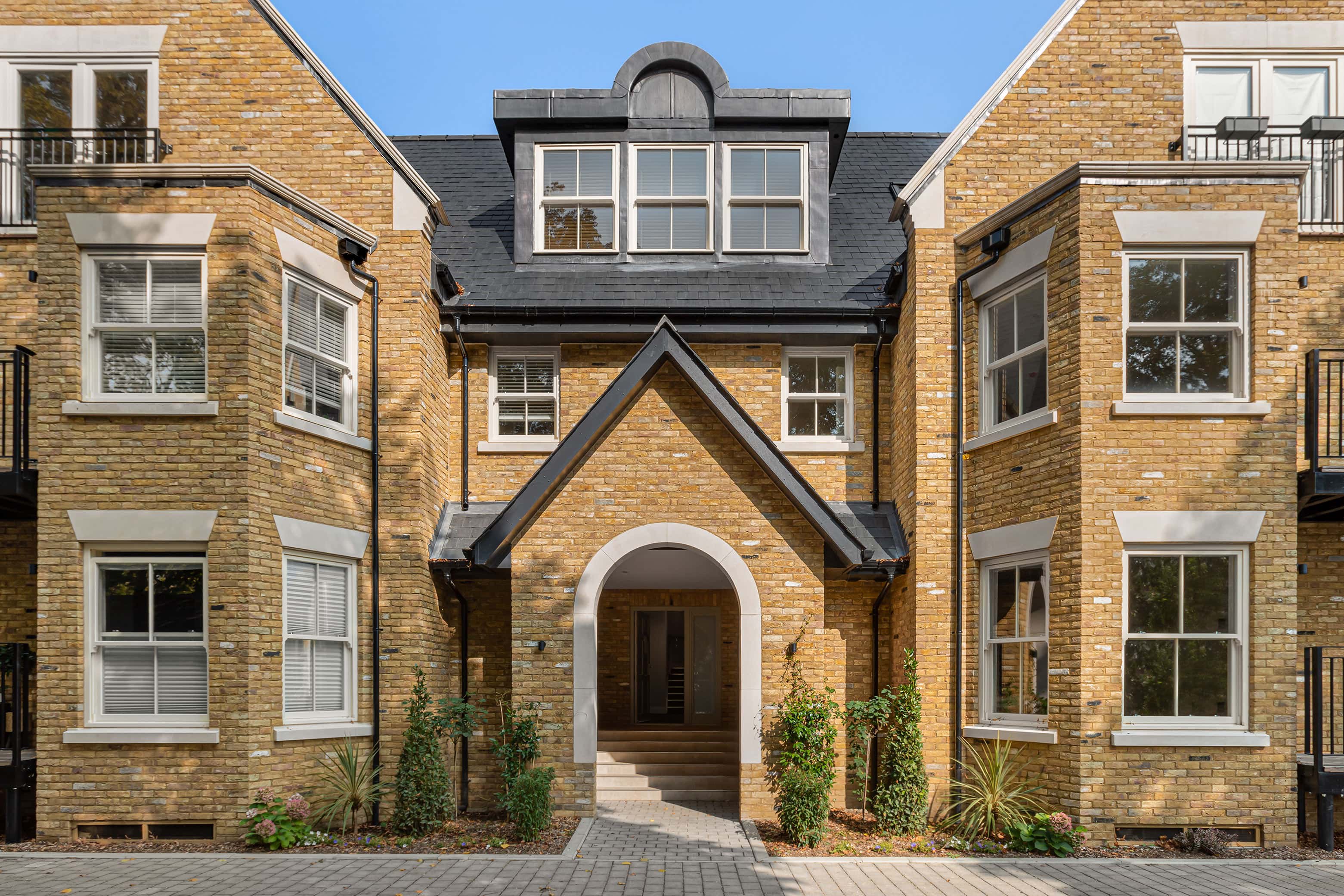 Front and centre section of the Vicarage Court building, close up.