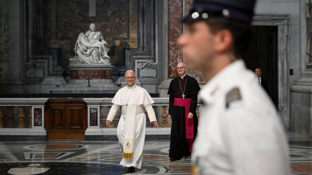 A Vatican gendarme stands guard as Pope Leo XIV walks past Michelangelo’s “Pietà” in St. Peter’s Basilica at the start of his Wednesday general audience on Aug. 19, 2026. | Credit: Vatican Media