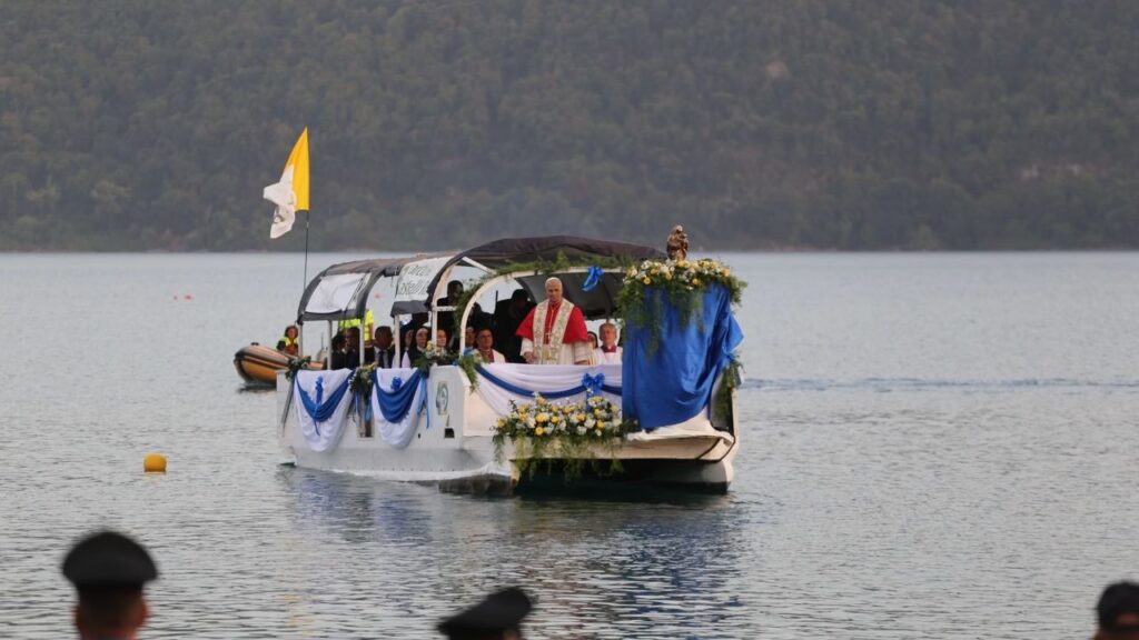Pope Leo XIV travels across Lake Albano, Castel Gandolfo, Aug. 29, 2026. Leo took part in a Marian procession on the lake, becoming the first pope to travel by boat across the waters there according to the Vatican. | Credit: Zofia Czubak/EWTN News