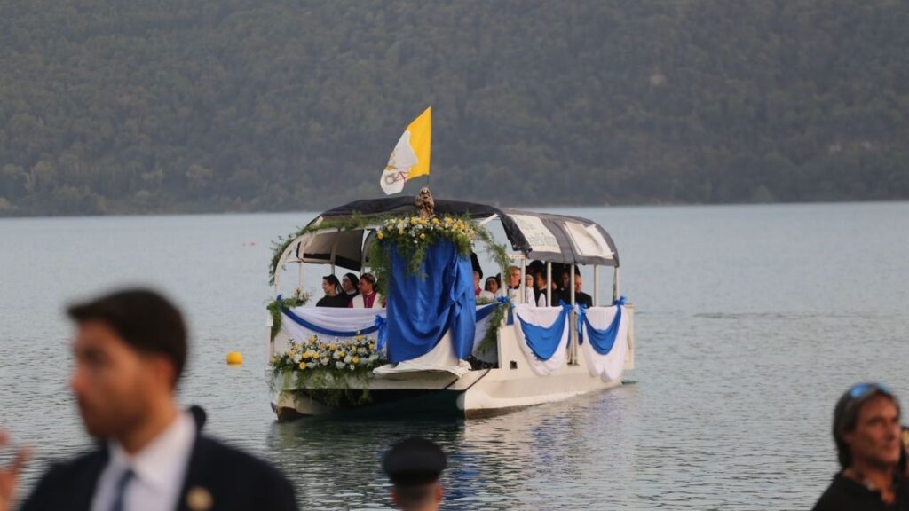 Pope Leo XIV travels across Lake Albano, Castel Gandolfo, Aug. 29, 2026. Leo took part in a Marian procession on the lake, becoming the first pope to travel by boat across the waters there according to the Vatican. | Credit: Zofia Czubak/EWTN News