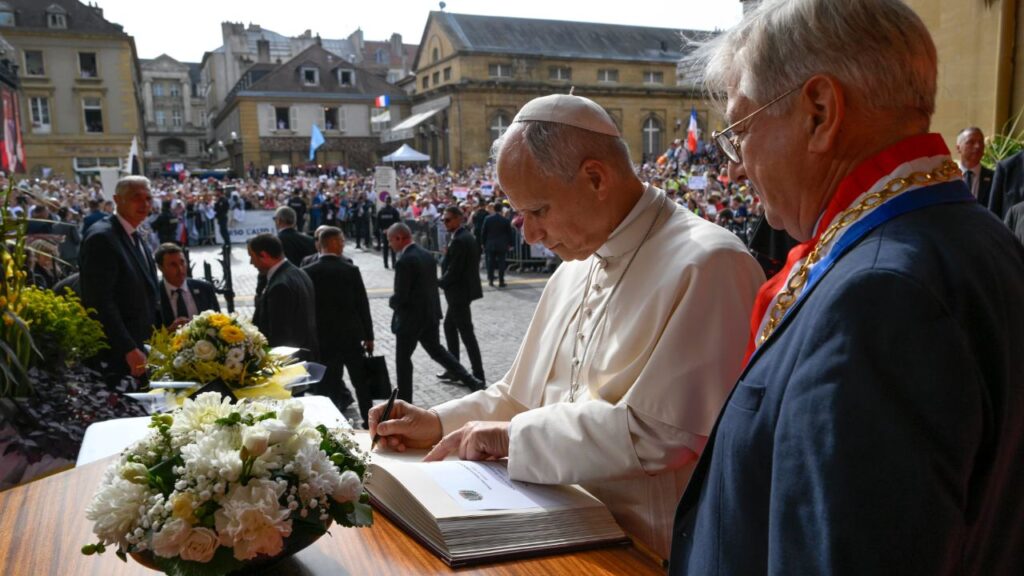 Pope Leo XIV signs the guest book upon entering the Cathedral of St. Stephen on Sept. 28, 2026, in Metz, France. | Credit: Vatican Media