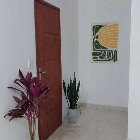 Foto real de cliente com o produto em casa
