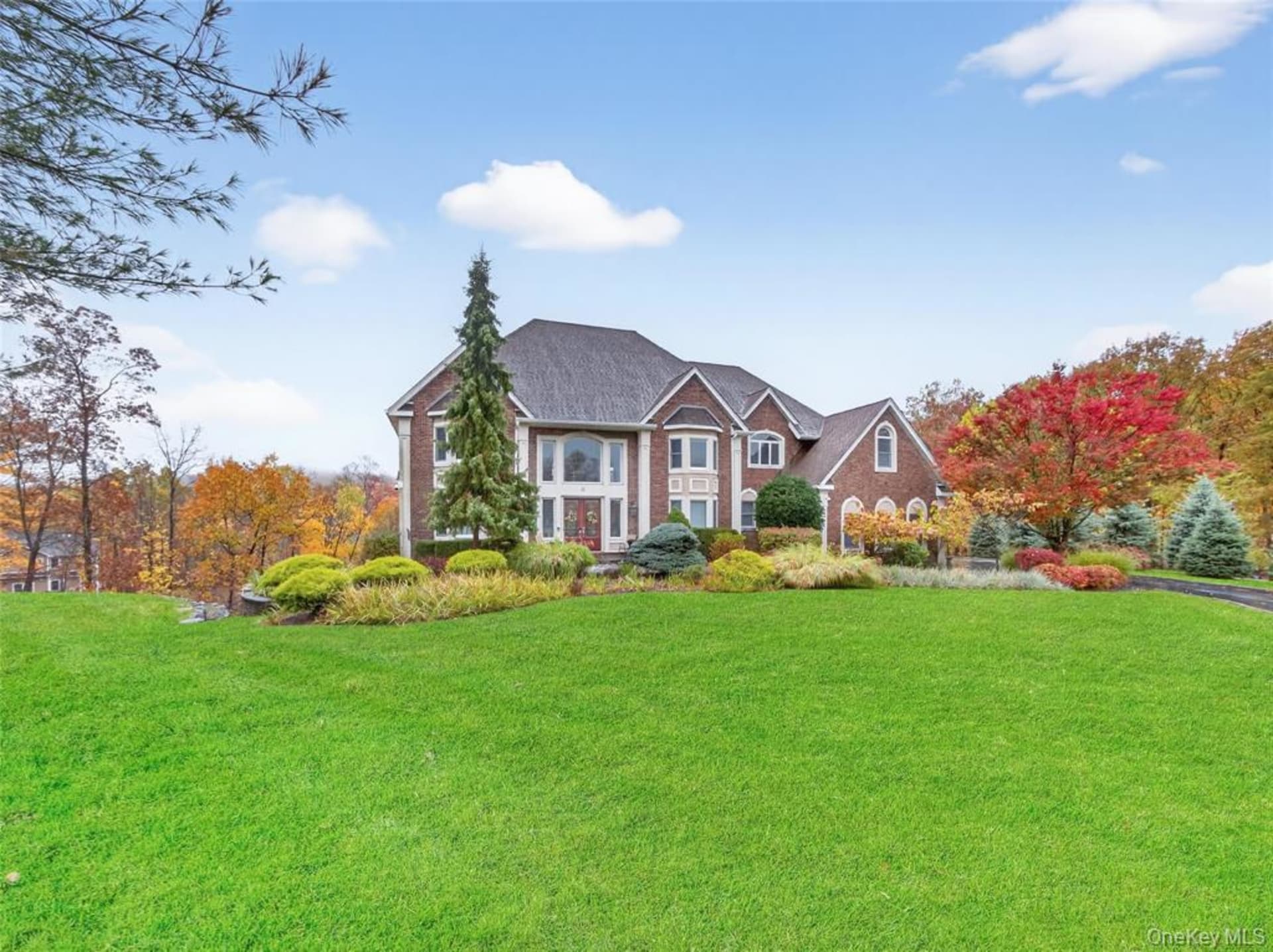 Welcome to 15 Beaver Pond Court in Stony Point — a stately ~5,000 sq ft Colonial set at the end of a private cul-de-sac with serene Hudson Valley mountain views.