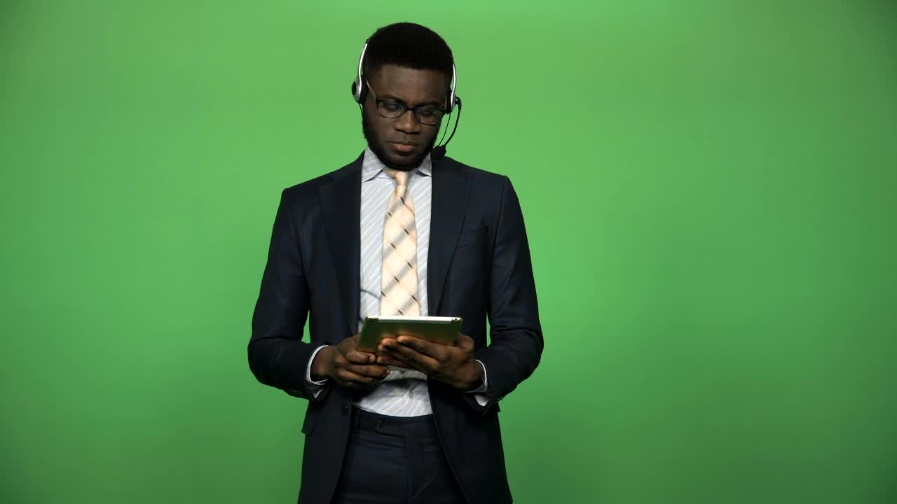 Business Headset and Tablet on Green Screen preview