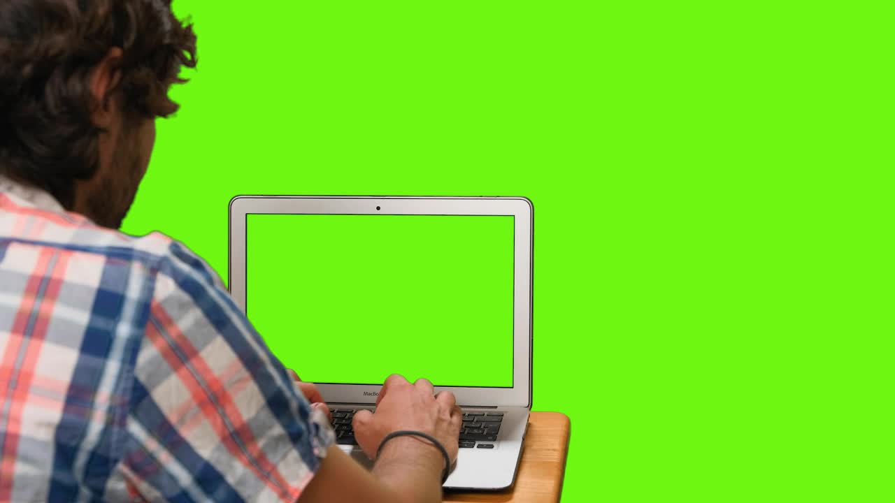 Boy on His Computer Green Screen preview