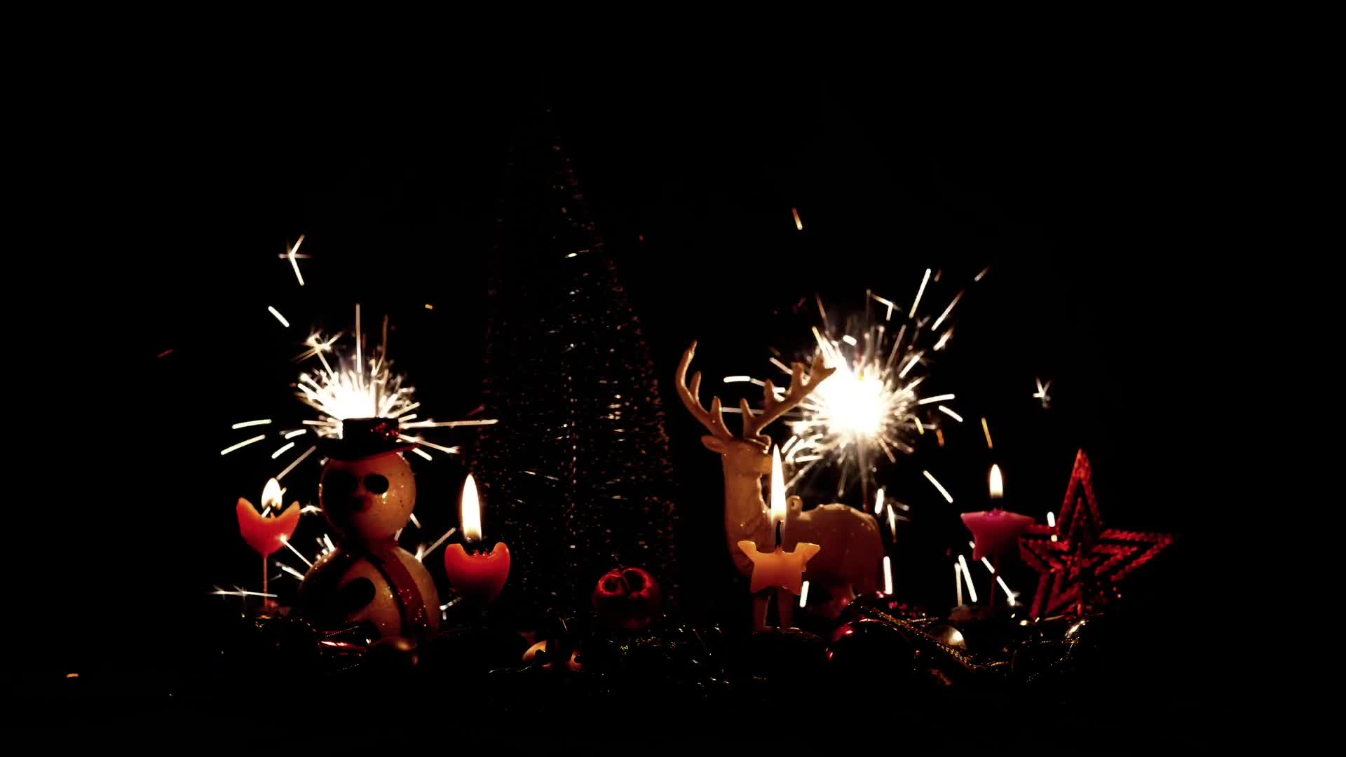 Stock video of sparklers on christmas toys preview