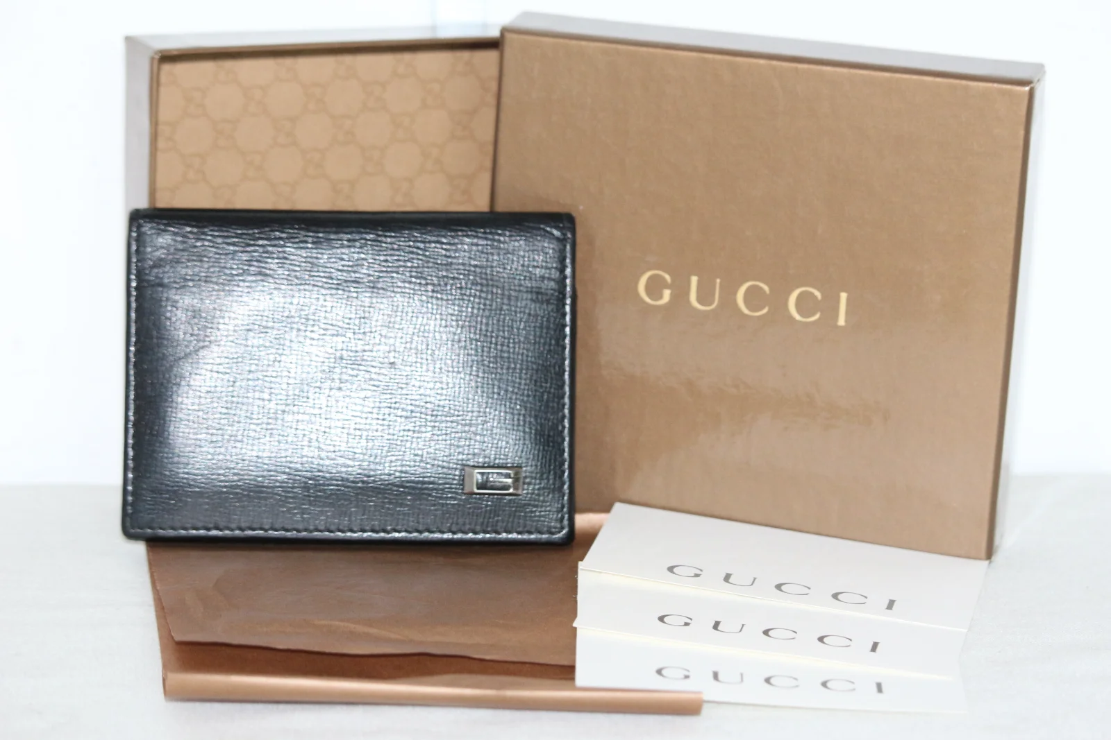 LEATHER GUCCI BI-FOLD MEN'S WALLET