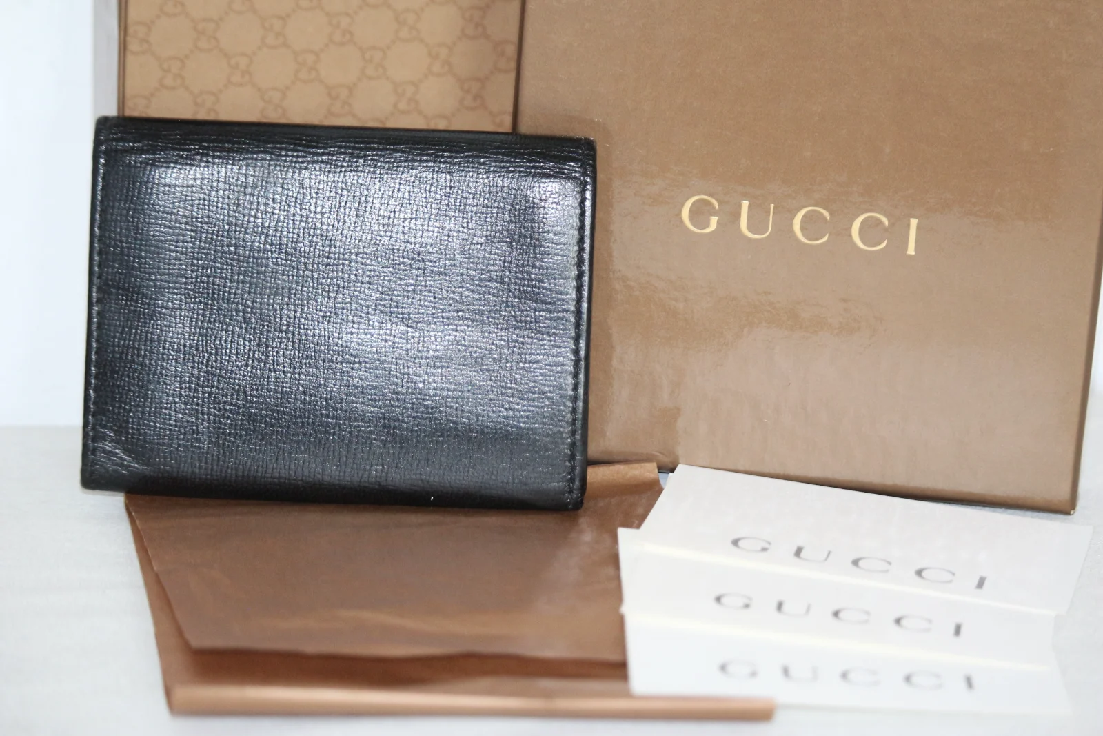 LEATHER GUCCI BI-FOLD MEN'S WALLET