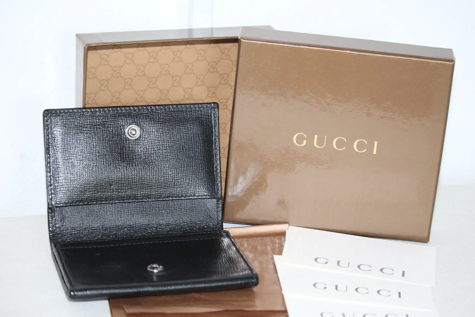 LEATHER GUCCI BI-FOLD MEN'S WALLET