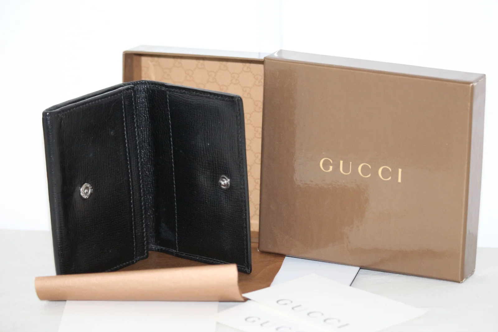 LEATHER GUCCI BI-FOLD MEN'S WALLET
