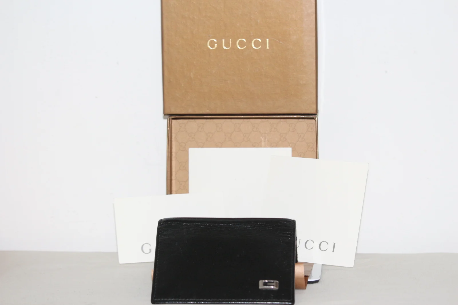 LEATHER GUCCI BI-FOLD MEN'S WALLET