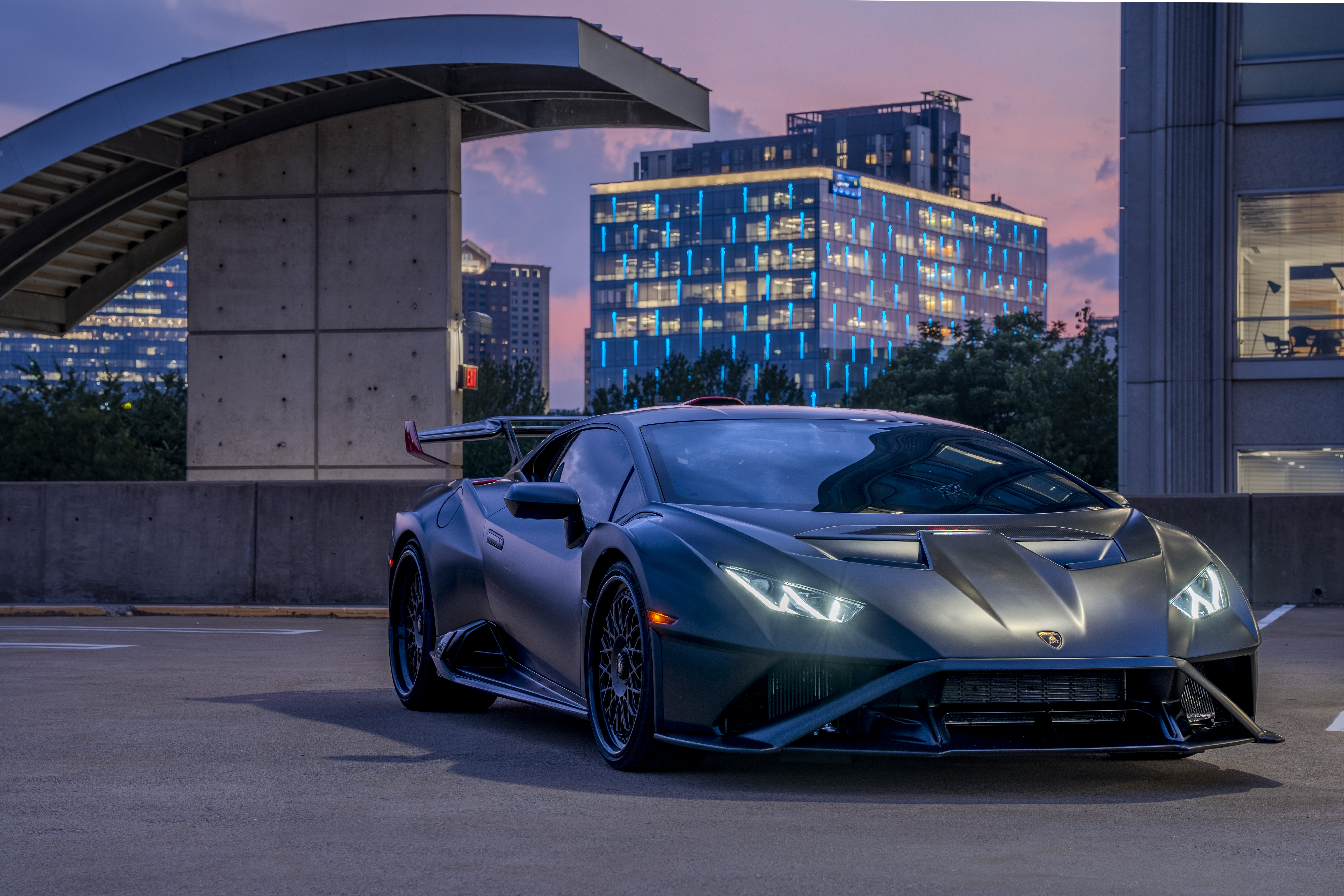 Lamborghini STO in a city sunset scene in Tysons VA — luxury automotive photography