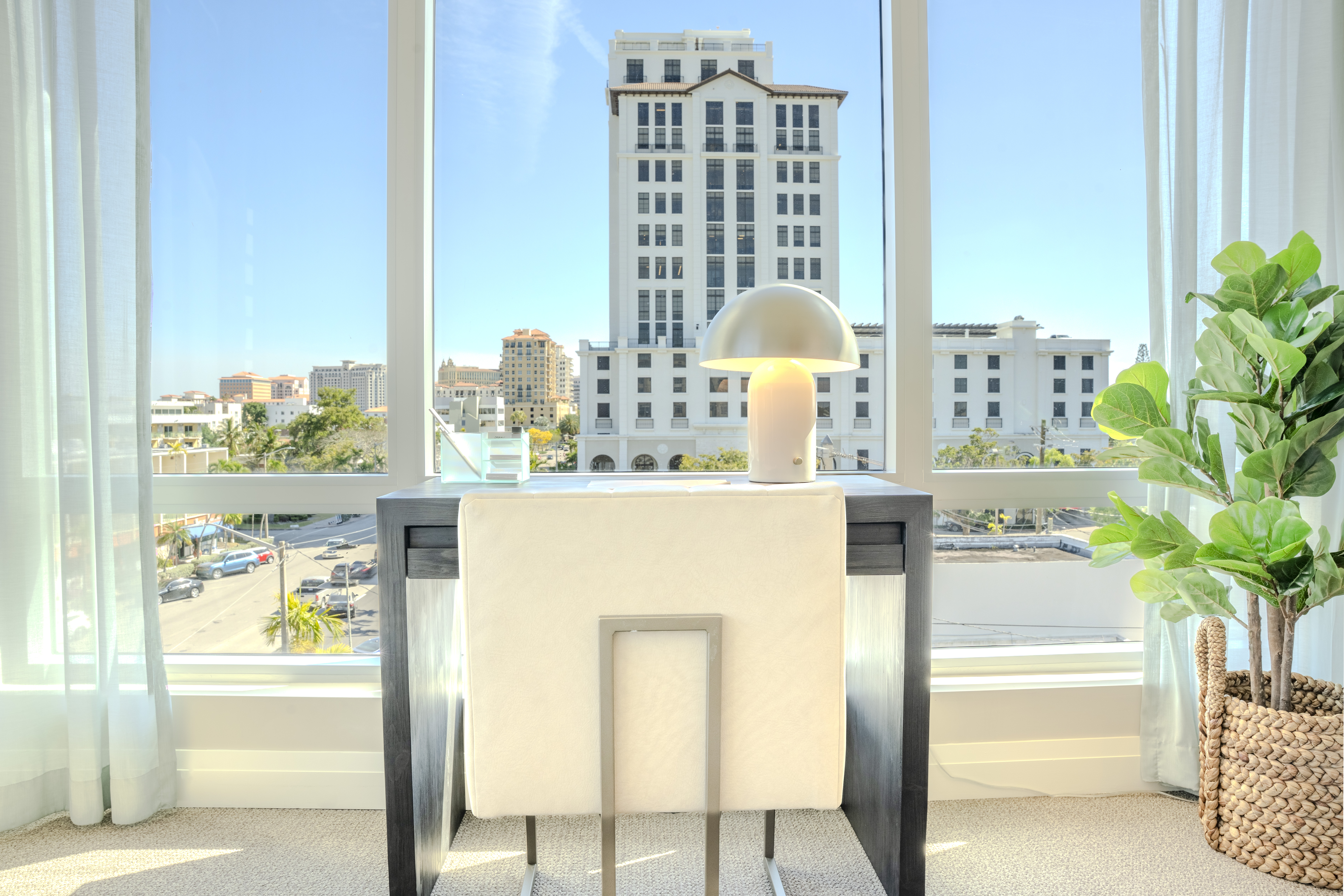 Lounge area overlooking the city at Sunrise Senior Living Coral Gables Florida — luxury senior living photography