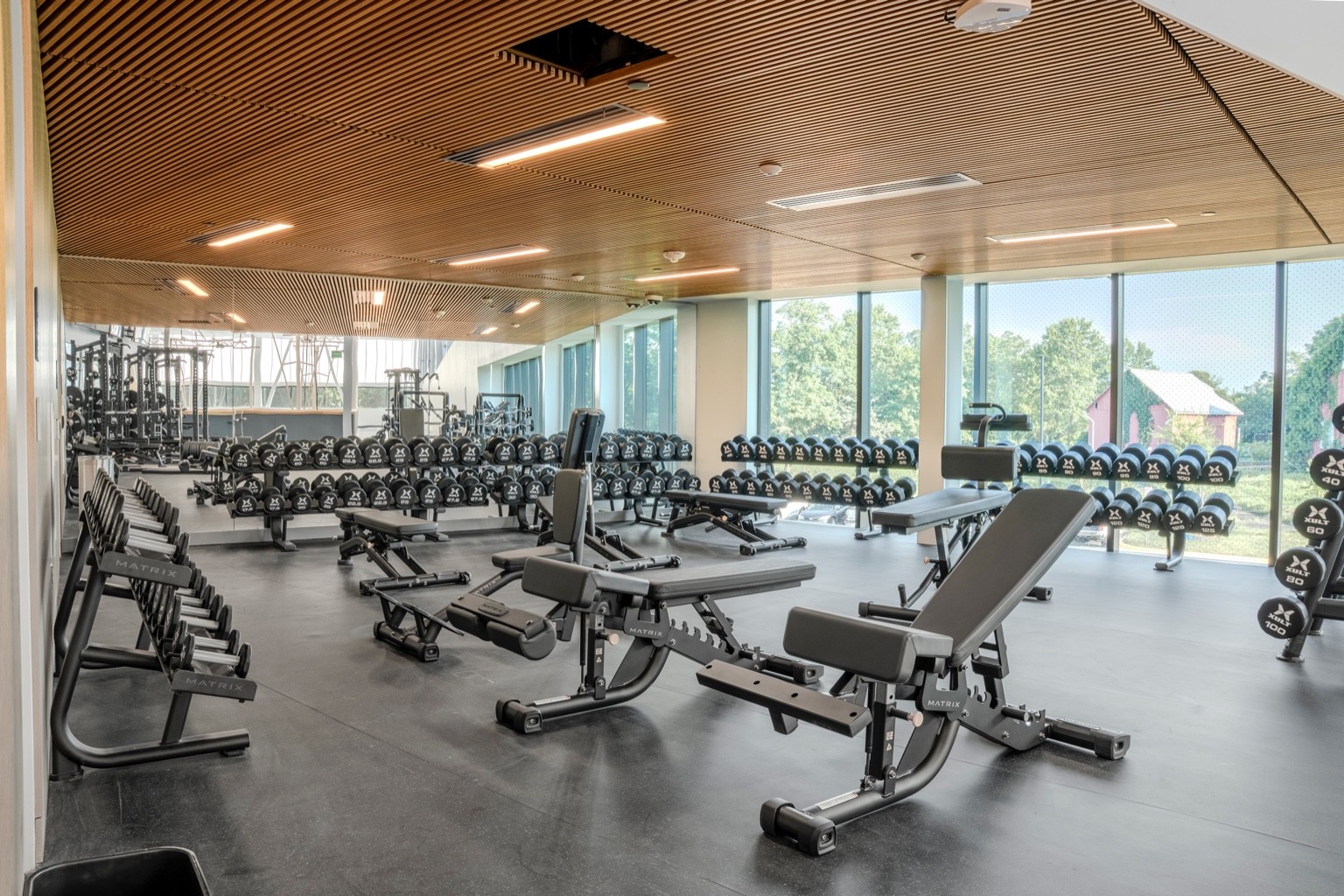Matrix Fitness dumbbells and benches at Ashburn Rec Center — gym equipment photography for fitness brands